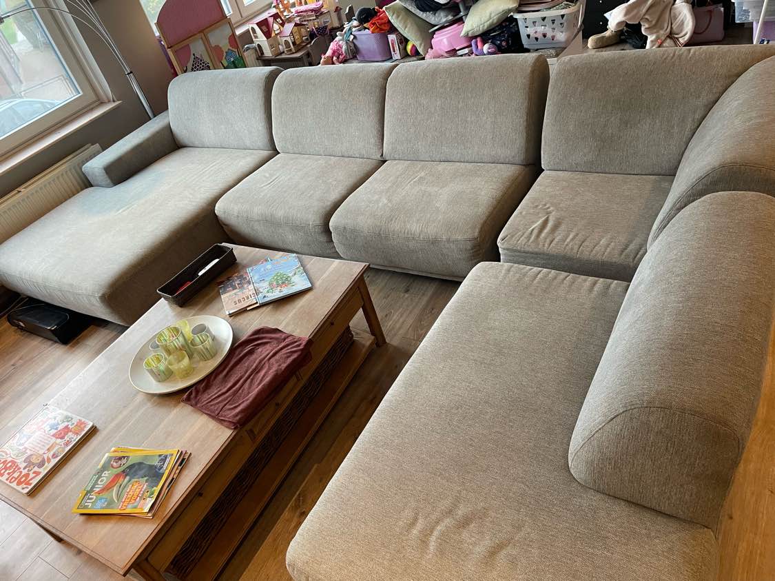 Zetel voor reiniging in Affligem - vlekken zichtbaar