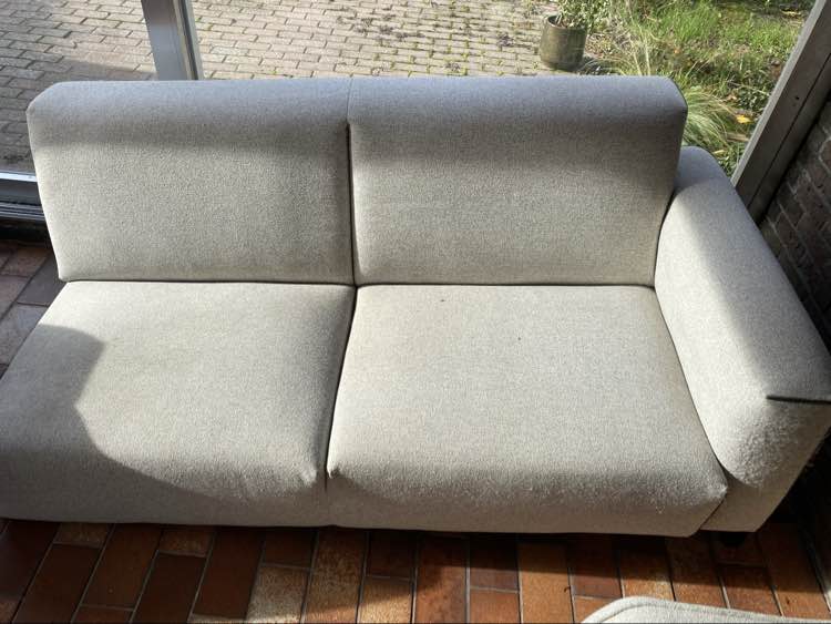 Zetel voor reiniging in Lommel - vlekken zichtbaar