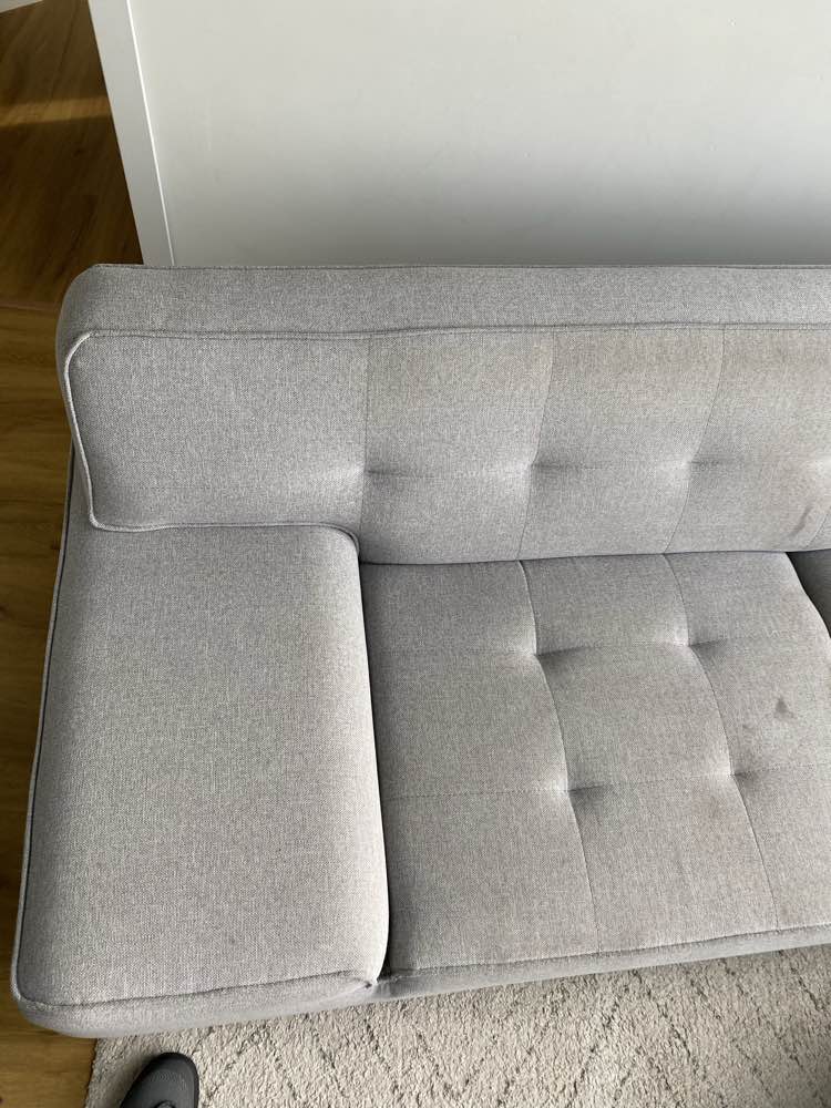 Zetel voor reiniging in Ninove - vlekken zichtbaar