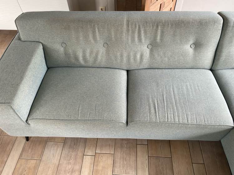 Zetel voor reiniging in Torhout - vlekken zichtbaar